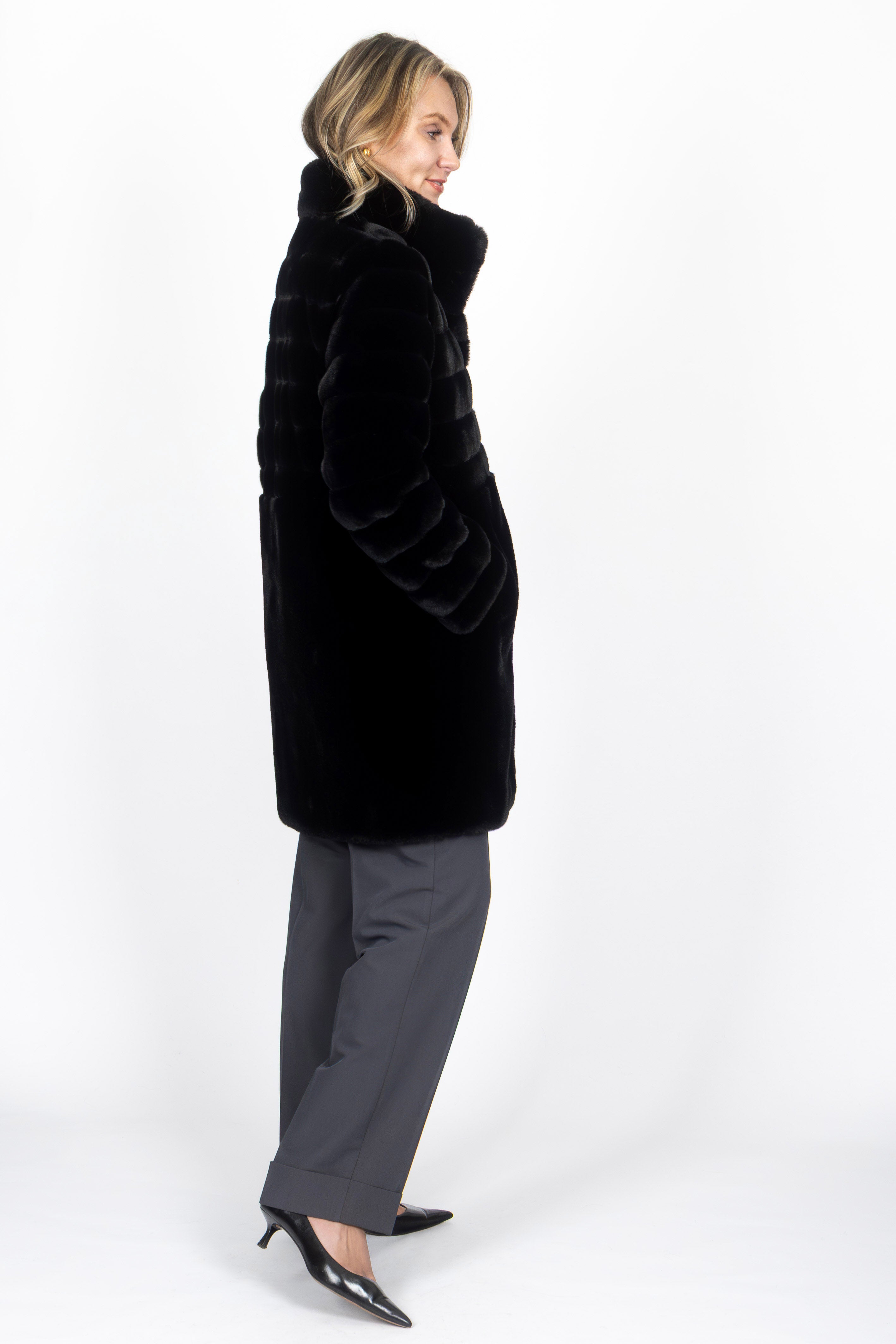 Timeless black faux fur coat with elegant fit